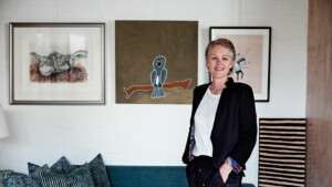 Nichola Dare with her much-loved Owl painting Dumbuny by Mabel Juli.