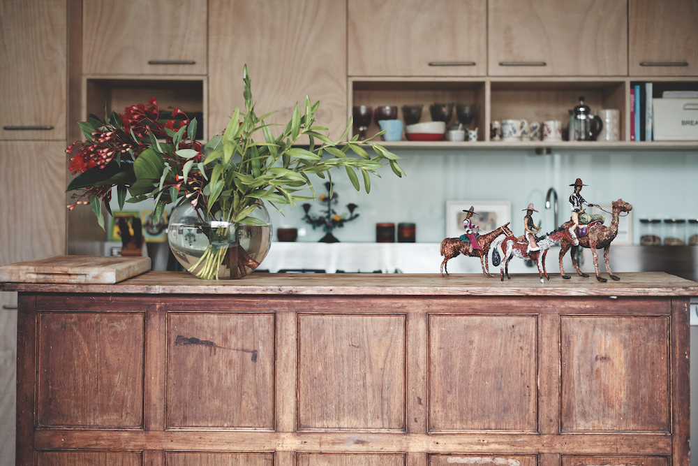 Wire sculptures by Jonny Young sit on the kitchen bench.